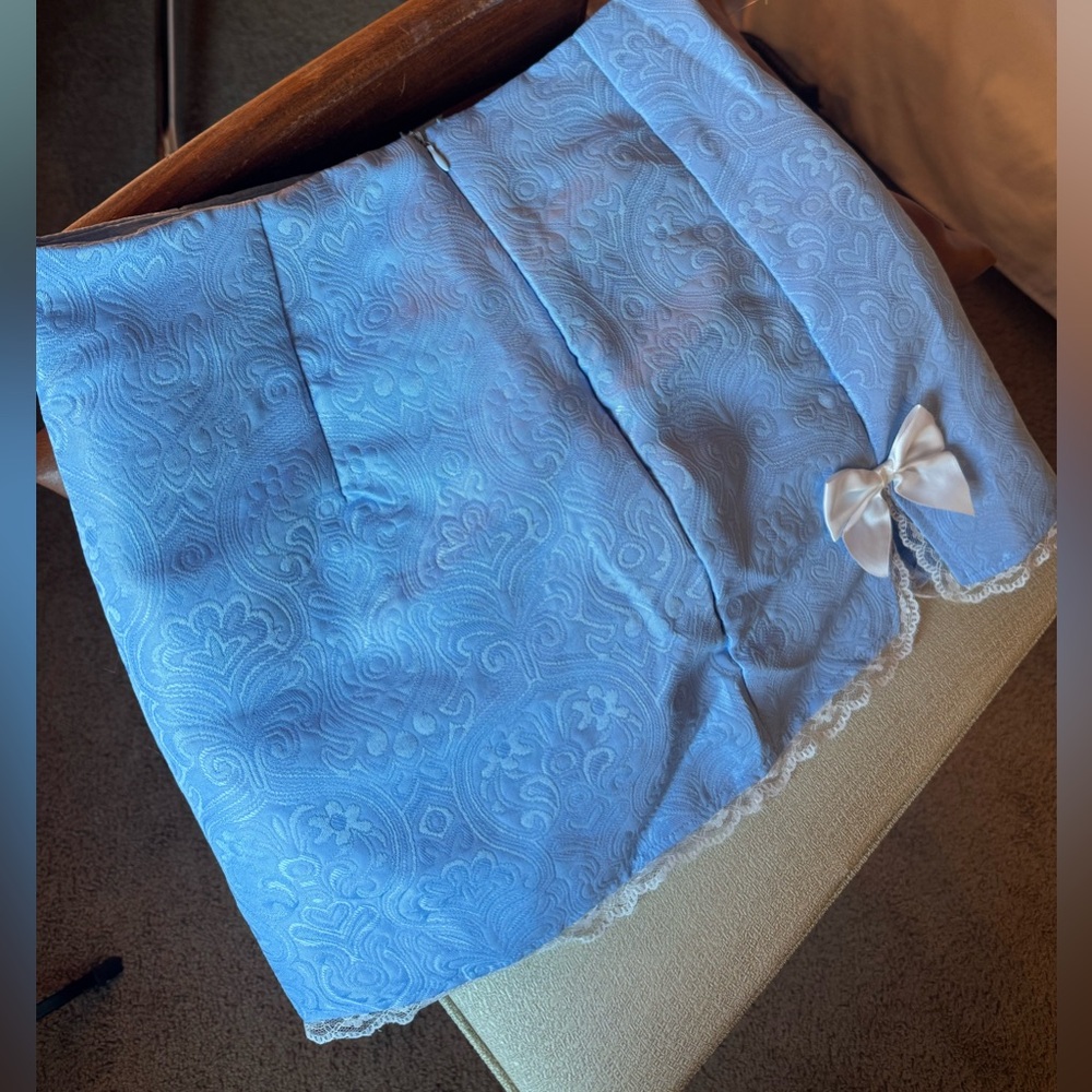 New with tags Medium blue mini skirt with white bows